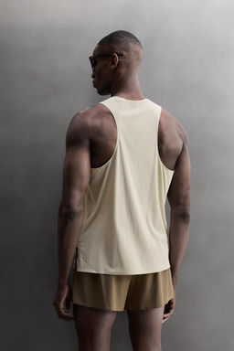 CAMISETA TANK LIGERA RUNNING / Verde gris