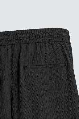 PANTAL?N RELAXED FIT EFECTO RELIEVE / Negro - Zara фото 10