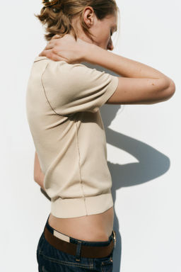 SHORT SLEEVE KNIT TOP WITH PIPING