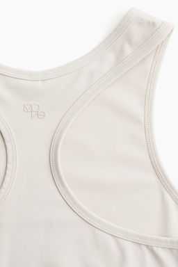 Top de deporte sin mangas en DryMove - H&m фото 7