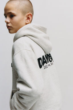 SUDADERA CAPUCHA TEXTO RIZO / Gris vigor?