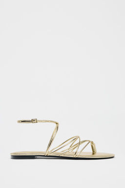GOLD STRAPPY FLAT SANDALS