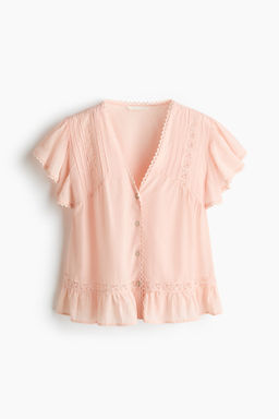 Blusa con inserciones de encaje