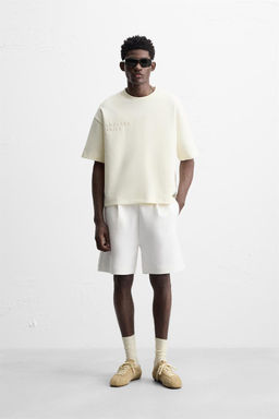 PLEATED TECHNICAL BERMUDA SHORTS
