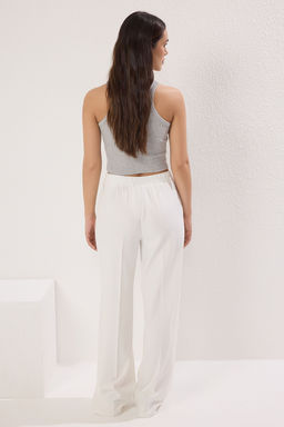 TRENDYOLMILLA Beyaz Arkas? Lastikli Wide Leg/Genis Paca Dusuk Bel Dokuma Pantolon TWOSS25PL00021  фото 4