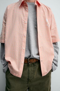 CAMISA BOXY FIT TEXTOS ESTAMPADOS / blanco-naranja - Zara фото 6