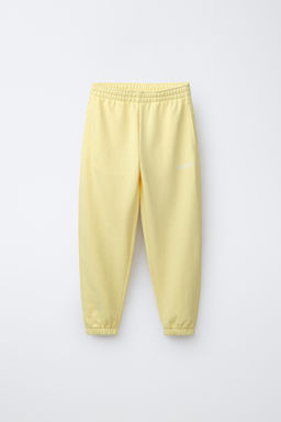 PANTAL?N JOGGER TEXTO / Amarillo