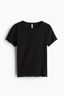 Camiseta con detalles sobrehilados