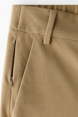 Chinos Four-way stretch Loose Fit - H&m фото 9