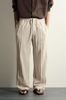 PANTAL?N T?CNICO RELAXED FIT EFECTO ARRUGADO / Beige - Zara фото 2