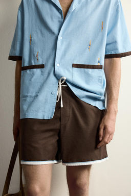 CAMISA RELAXED FIT BORDADO NADADORES / Celeste