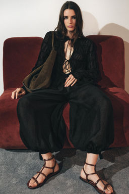 SEMI-SHEER KNIT BLOUSE WITH GATHERED DETAILS