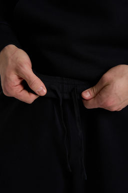 Брюки трикотажные Черный ANTA SPORTS CLUB Knit Track Pants фото 7