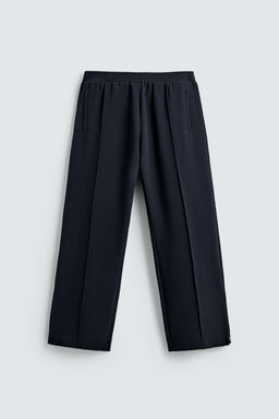 FLOWING TROUSERS WITH ZIPS