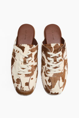 Mules de piel estilo deportivas