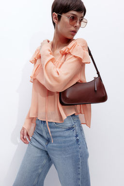 Blusa de volantes efecto arrugado