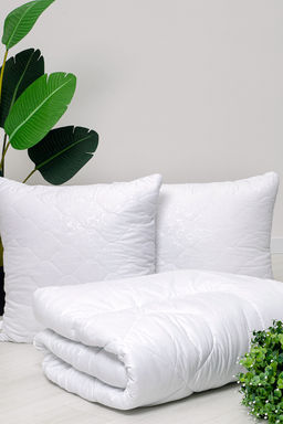 Подушка в стеганом чехле из микрофибры Raposa Home