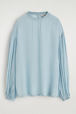 BLUSA TRANSPARENTE CON MANGAS GLOBO