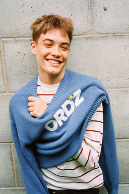 KNIT SWEATER WITH SLOGAN