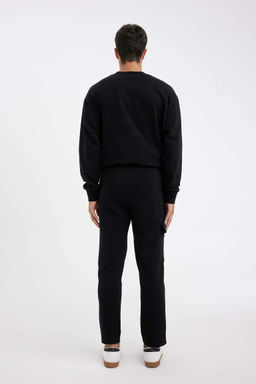 Мужские черные приталенные спортивные брюки с карманами-карго и прямыми штанинами - Defacto фото 7