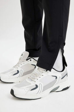 DeFactoFit Облегающие тканые спортивные штаны для бега с двумя карманами на молнии  фото 7