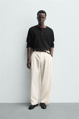 PLEATED WOOL BLEND TROUSERS