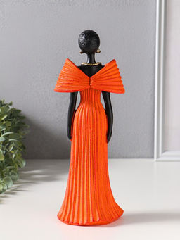 Сувенир полистоун "Девушка в ярко-оранжевом платье с большим бантом" чёрный 11х9,5х30,5 см   1092991