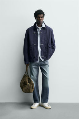 CAZADORA T?CNICA RELAXED FIT / Marr?n