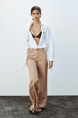 WIDE-LEG HIGH-WAIST TROUSERS