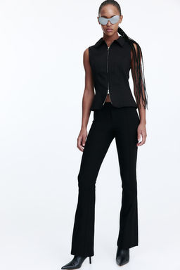 Top sin mangas con cuello camisero y cremallera - H&m фото 2