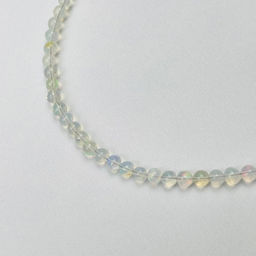 Колье на увеличение из Опала