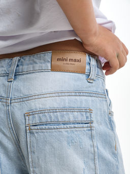 Джинсы клеш рваные для весны и лета 33-1053 св.голубой - Mini maxi фото 5