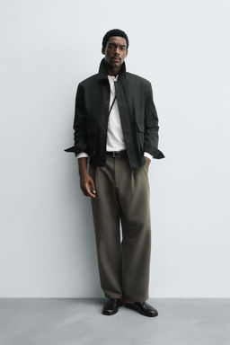 RELAXED FIT PLEATED TROUSERS