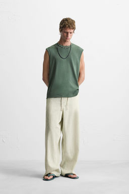 STRIPED BAGGY FIT TROUSERS