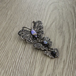 Брошь-подвеска "Бабочки" со вставкой из гелиотиса