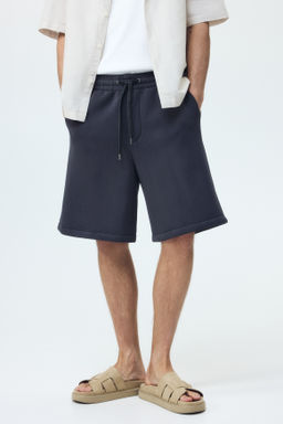 Pantal?n corto efecto neopreno Relaxed Fit - H&m фото 6