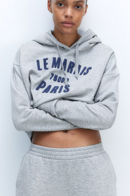 Sudadera con capucha y motivo de texto