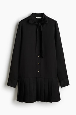 Vestido camisero con falda plisada