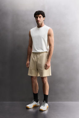 CAMISETA TANK HEAVYWEIGHT / Blanco