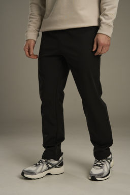 Брюки текстильные утепленные Черный ANTA TRN Woven Track Pants  фото 4