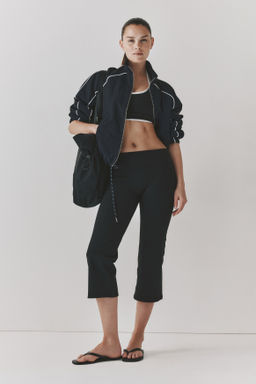 Leggings capri de deporte con SoftMove Flared - H&m фото 4