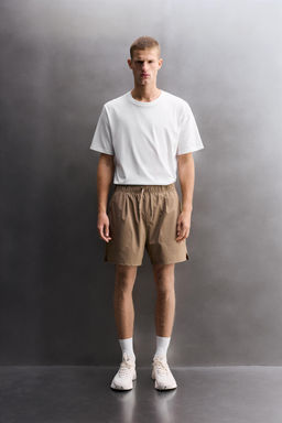 PANTALONES CORTOS T?CNICOS TRAINING / Marr?n claro