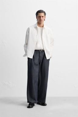 PLEATED WIDE-LEG JEANS