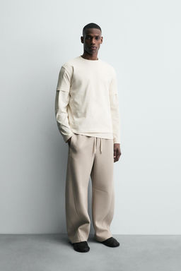 T-SHIRT WITH RAISED TEXT