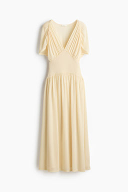 Vestido midi en punto vaporoso