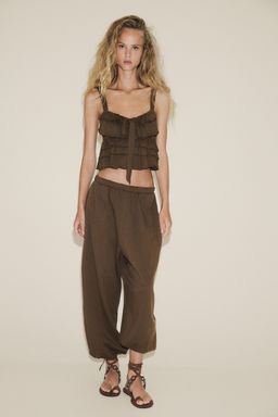 RUFFLED TOP WITH BOW