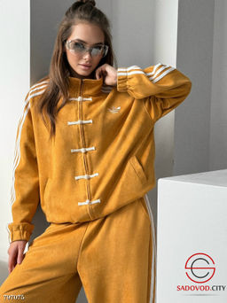 крутой костюм женский со вставками