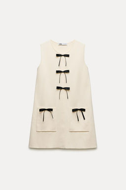 KNIT MINI DRESS WITH CONTRAST BOWS