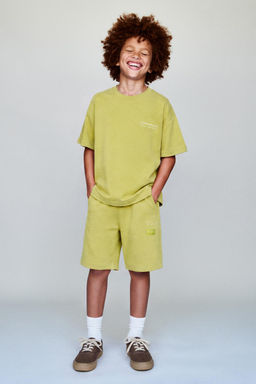 CONJUNTO CAMISETA Y BERMUDA INTERLOCK / Pistacho