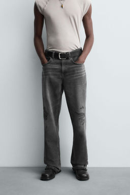 RIPPED BELL BOTTOM FIT JEANS